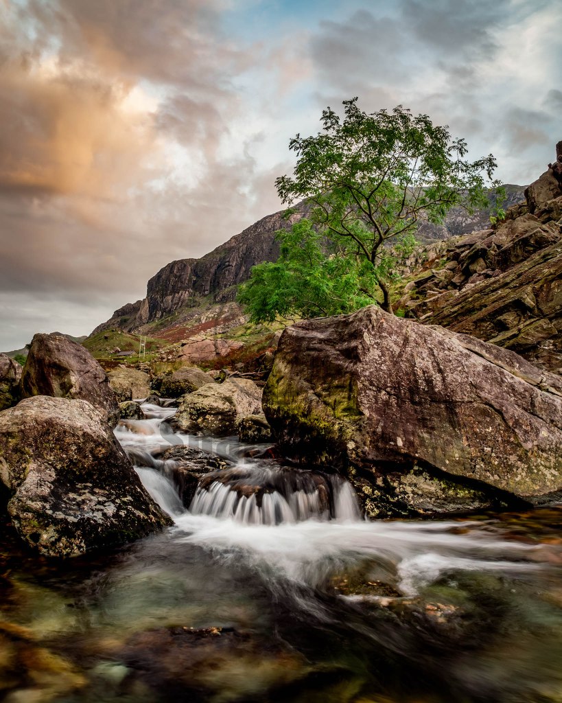 Portrait composition of a cascade on Afon Nant Peris below Pen y Pass in North Wales