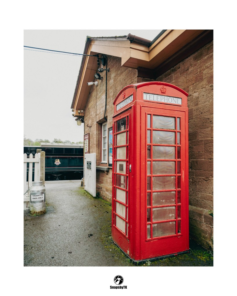 A British Red Telephone box at the entrance to one of the platforms at Bishops Lydeard